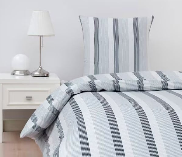 Et billede af et sengesæt i bomuldssatin